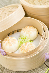 Fototapeta na wymiar Salapao - Thai steamed buns filled with chicken.