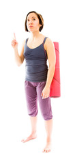 Young woman carrying exercise mat pointing her finger up