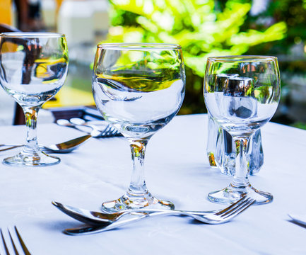 Empty glasses on the table outdoors
