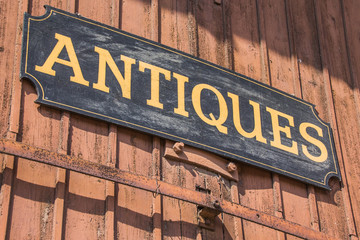 Old antiques sign