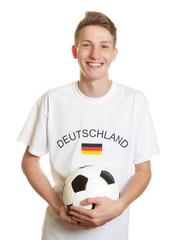 Lachender deutscher Fussball Fan mit blonden Haaren