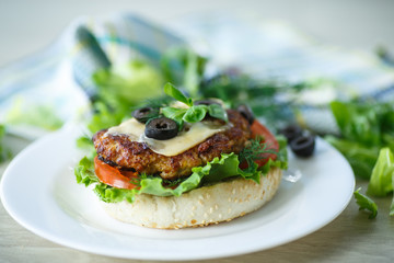 tasty hamburger with lettuce and tomato