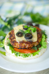 tasty hamburger with lettuce and tomato