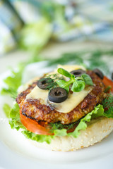 tasty hamburger with lettuce and tomato