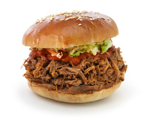 pulled pork sandwich isolated on white background © uckyo