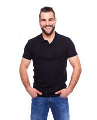 Young happy man in a black polo shirt