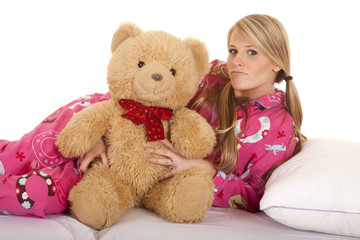 woman pink pajamas bear lay on side look