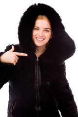 Young woman showing smiley face