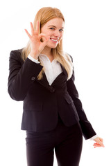 Portrait of a businesswoman gesturing OK