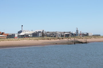 Fototapeta premium Pharmaceutical / medicines factory by river