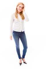 Fototapeta premium Young woman standing and smiling