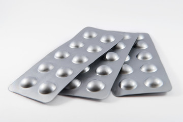 Pill round shape foil-wrapped