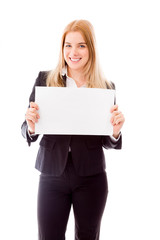 Businesswoman holding a blank placard