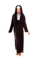 Young nun looking frustrated and shouting