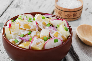 Potato salad with radishes and onions