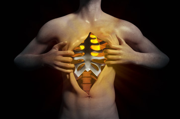 Heart inside a ripped open chest