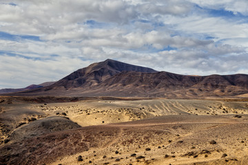 Fototapeta na wymiar Ajaches mountain in Lanzarote Punta Papagayo at Canary Islands