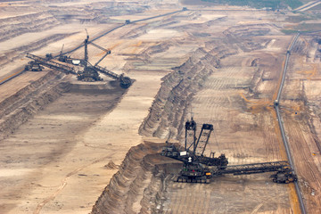 Very large excavators digging lignite in a mine