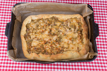 cheese chicken pie in a large bowl on the table