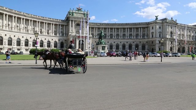 VIENNA, AUSTRIA - CIRCA 2013: The Hofburg palace in Michaelerplatz square circa 2013 in Vienna, Austria. 