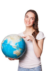 Pretty smiling young lady holding a world globe