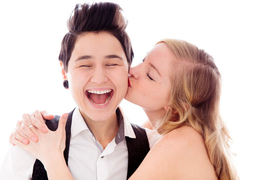 Woman kissing to her lesbian partner