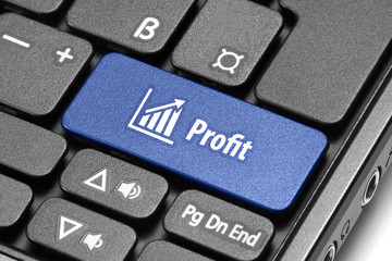 Profit concept. Blue hot key on computer keyboard with graph cha