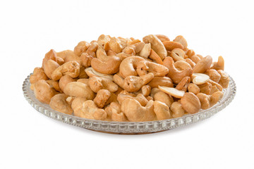 cashew nuts in a crystal dish isolated