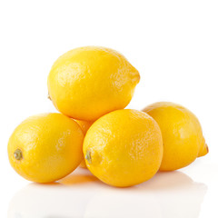 ripe lemons on a white background