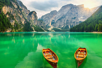 Wonderful mountain lake and boats in the Dolomites,Italy