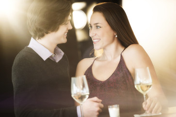 Loving Couple Looking At Each Other In Nightclub