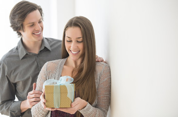 Man Giving Birthday Gift To Woman