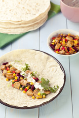 tortilla wraps with meat and vegetables