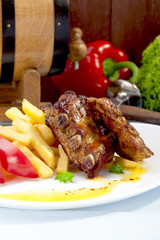 Grilled ribs on plate