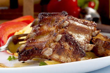 Grilled ribs on plate