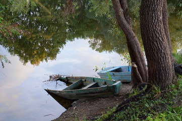 Two old boat on the river