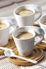 cups of coffee on place mats
