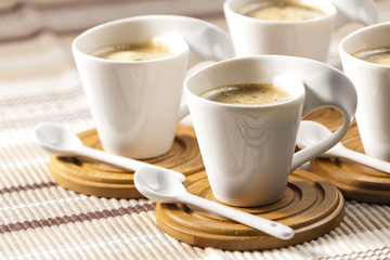 cups of coffee on place mats