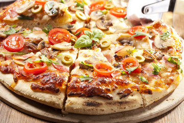 Pizza with ham and mushrooms