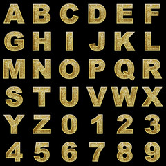 golden alphabet on black background