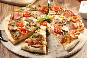 Pizza with ham and mushrooms