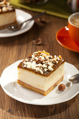 cheesecake with nuts on plate