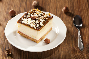 cheesecake with nuts on plate