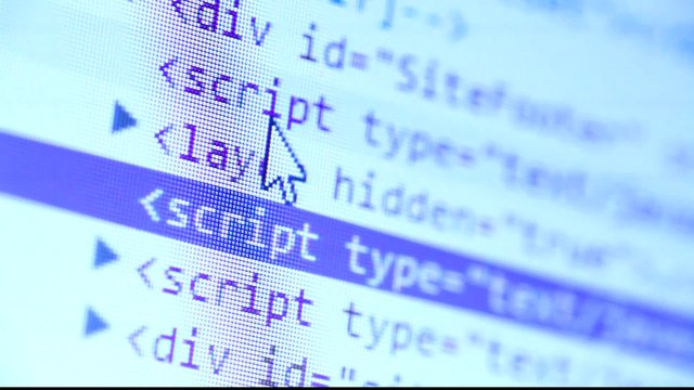 Close up of HTML Codes on LED Screen