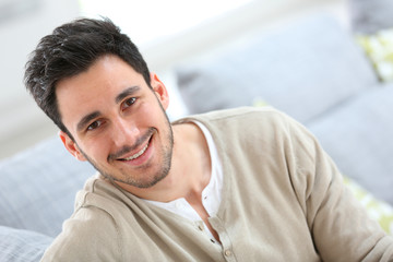 Portrait of young man relaxing at home