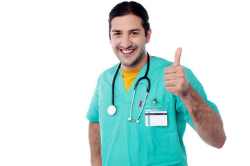 Smiling doctor with okay gesture