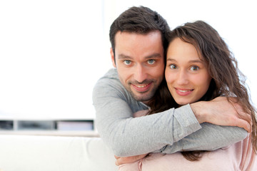 Fototapeta premium Portrait of a young happy couple
