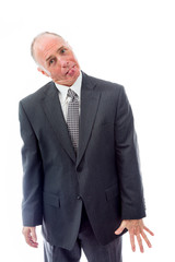 Businessman sticking out his tongue