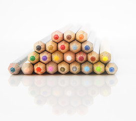 Heap of color pencil on whilte