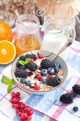 Healthy breakfast with granola and fresh berries